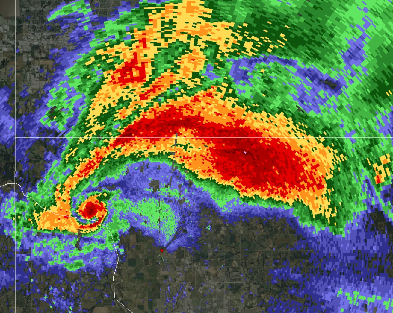 A supercell thunderstorm that produced an EF5 tornado in Moore, OK, in May 2013, as seen from a modern Doppler weather radar near Oklahoma City.